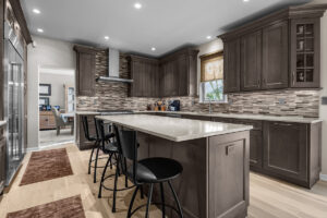 Maple cabinetry with dockside gray finish. Aspen white quartz countertops